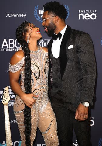 <p>Rodrigo Varela/Getty</p> Bianca Belair and Montez Ford in December 2021