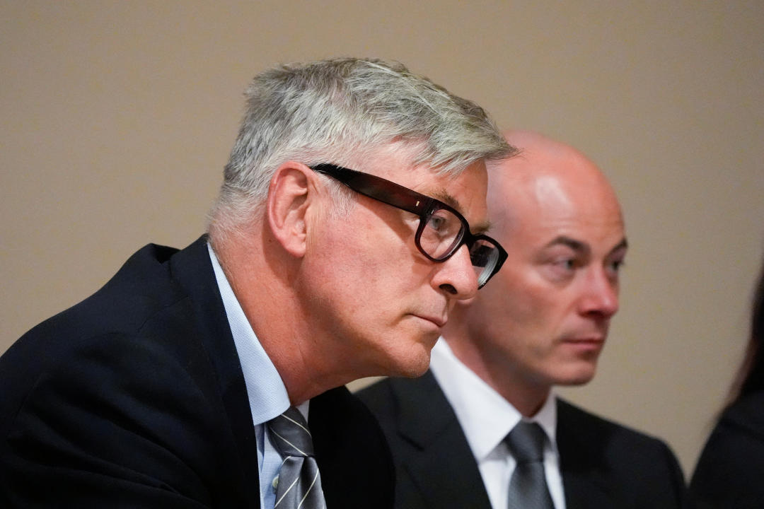 Alec Baldwin listens to testimony during a pretrial hearing.