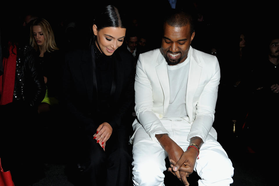 PARIS, FRANCE - MARCH 03: Kim Kardashian and Kanye West attend Givenchy Fall/Winter 2013 Ready-to-Wear show as part of Paris Fashion Week on March 3, 2013 in Paris, France. (Photo by Pascal Le Segretain/Getty Images)