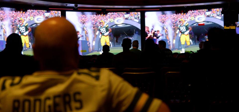 A Green Bay Packers fan watches Sunday's Packers-New York Giants game at Hippodrome Casino in London.