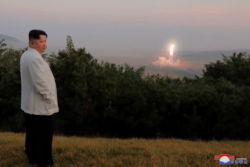 FILE PHOTO: North Korea's leader Kim Jong Un oversees a missile launch at an undisclosed location in North Korea