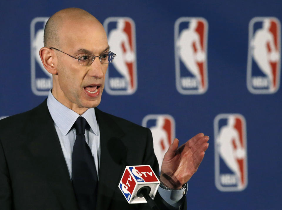 NBA Commissioner Adam Silver addresses the media during a news conference in New York, Tuesday, April 29, 2014. Silver announced that Los Angeles Clippers owner Donald Sterling has been banned for life by the league, in response to racist comments the league says he made in a recorded conversation. (AP Photo/Kathy Willens)