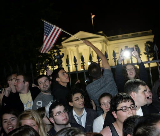 People gather at the White House late on 1 May 2011 to celebrate the death of Osama Bin Laden. AFP Photo / Chris Kleponis