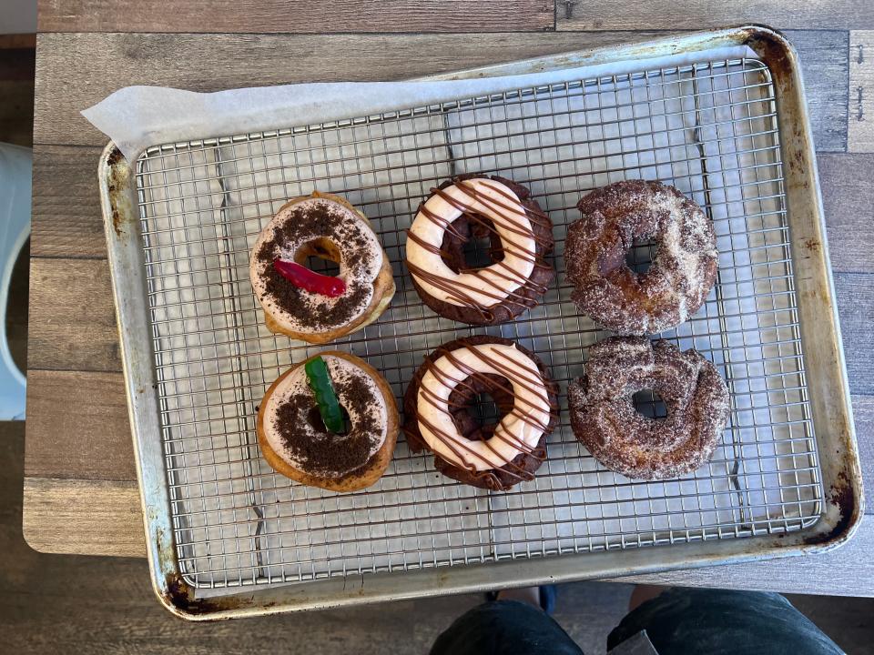 In addition to their regular menu, Brown's Doughnuts and Pastry Co. offers special monthly flavors, such as their Fall Cleanout, Pumpkin Spice and Apple Cider doughnuts shown here.