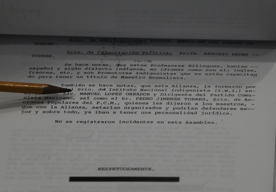 An old document from files drawn up by spies from the now-extinct Federal Security Department, Mexico's old domestic intelligence agency, shows the name Andrés Manuel López Obrador and claims he is a local leader of the Mexican Communist Party, as the files are shown to the press at the National Archive headquarters in Mexico City, Tuesday, April 16, 2019. Questioned about similar reports in March, now president of Mexico, López Obrador said: “I was not a member of the Communist Party, but I did support social activists.” (AP Photo/Marco Ugarte)