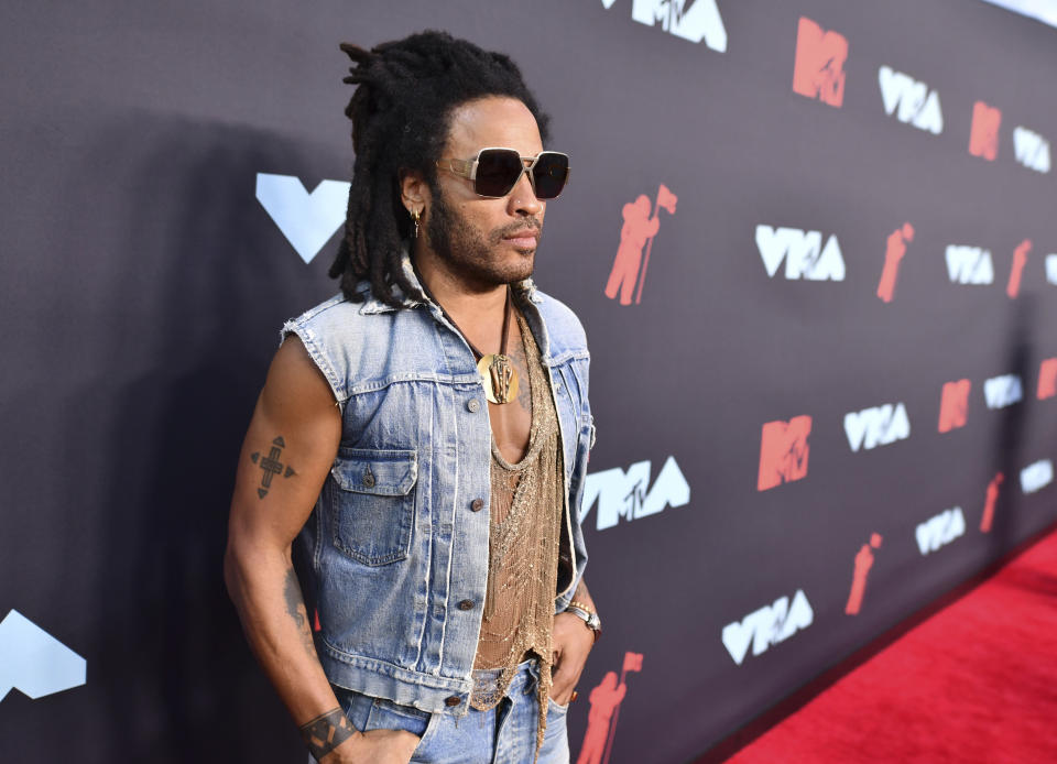 FILE - Lenny Kravitz arrives at the MTV Video Music Awards in Newark, N.J. on Aug. 26, 2019. In a new memoir, "Let Love Rule," Kravitz explores his childhood and ends with him on the verge of stardom and deeply in love with actress Lisa Bonet. (Photo by Charles Sykes/Invision/AP)