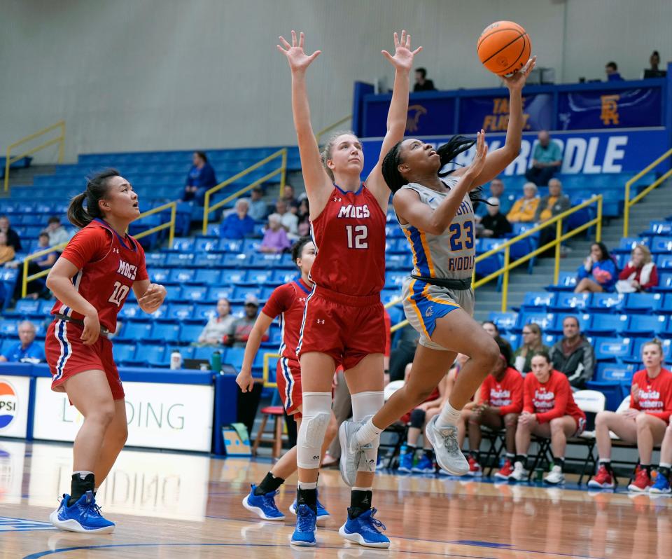 Embry-Riddle's Madyson Jean-Louis (23) drives for the lay-up during a game with Florida Southern, Wednesday, Feb. 7, 2024.