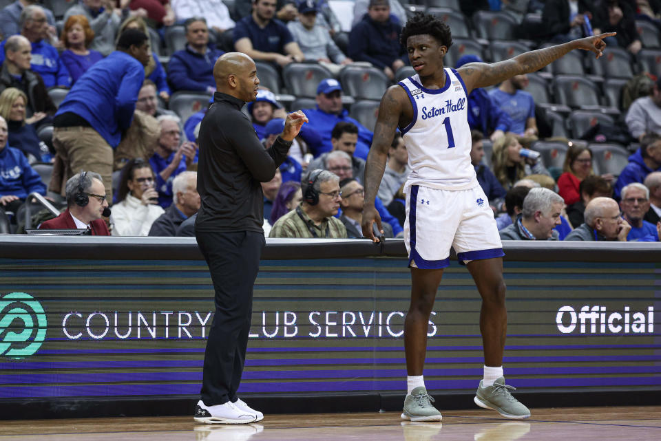 Feb 14, 2024; Newark, New Jersey, USA; Seton Hall Pirates head coach Shaheen Holloway talks with Seton Hall Pirates guard Kadary Richmond (1) during the first half against the Xavier Musketeers at Prudential Center. Mandatory Credit: Vincent Carchietta-USA TODAY Sports