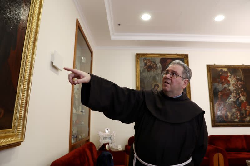 Father Francesco Patton, the Custos of the Holy Land for the Roman Catholic church gestures during an interview with Reuters at St Saviour's Monastery in Jerusalem's Old City