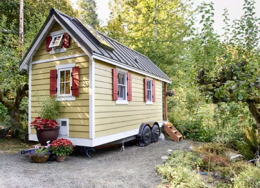 <body> <p>Honey-toned paint, maroon shutters, and a gabled roof with an industrial vibe make this 20-foot bungalow into a dream home for tiny-house lovers. Situated in Olympia, Washington, the sunny <a rel="nofollow noopener" href=" http://www.bobvila.com/slideshow/on-the-waterfront-10-tiny-lake-houses-47635?bv=yahoo" target="_blank" data-ylk="slk:waterfront property;elm:context_link;itc:0;sec:content-canvas" class="link ">waterfront property</a> boasts a well-stocked kitchen, sleeping loft, and outdoor fire pits for the ultimate glamping experience.</p> <p><strong>Related: <a rel="nofollow noopener" href=" http://www.bobvila.com/slideshow/before-and-after-9-totally-amazing-mobile-home-makeovers-47350?#.WD-t2KIrKRs?bv=yahoo" target="_blank" data-ylk="slk:Before and After: 9 Totally Amazing Mobile Home Makeovers;elm:context_link;itc:0;sec:content-canvas" class="link ">Before and After: 9 Totally Amazing Mobile Home Makeovers</a> </strong> </p> </body>