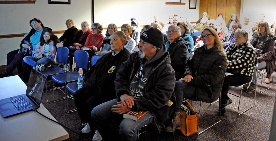 A large crowd attended author Gregg Olsen talk at the Orrville library on a book he wrote about the death of Ida Stutzman 30 years ago.