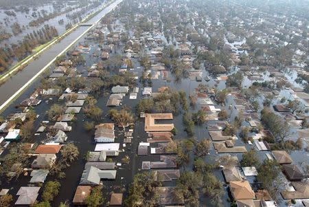 Thousands of houses in New Orleans, Louisiana remain under water one week after Hurricane Katrina went through Louisiana, Mississippi, and Alabama in this September 5, 2005 file photo. REUTERS/Allen Fredrickson/Files