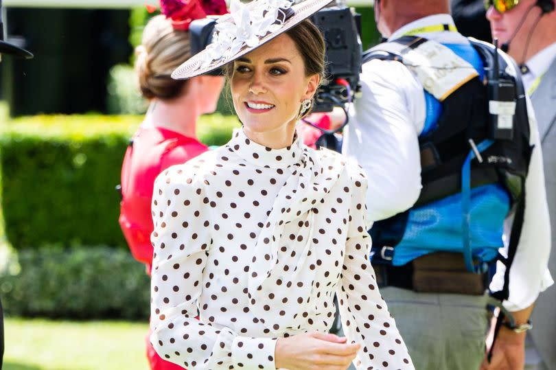 Kate Middleton wearing a spotted dress during race day