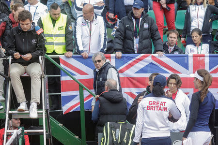 Romania's head coach Ilie Nastase leaves the tennis court where the FedCup Group II play-off match between Romania and Great Britain takes place, in Constanta county, Romania, April 22, 2017. Inquam Photos/George Calin/via REUTERS