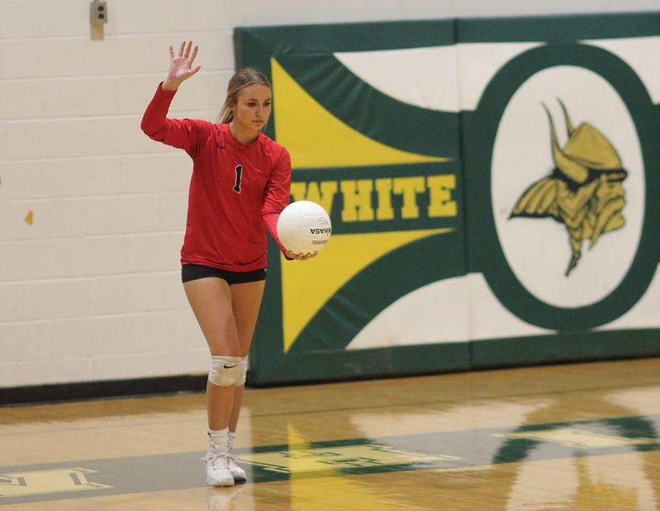 Jacksonville's Katie Lovell serves against White Oak earlier this season.