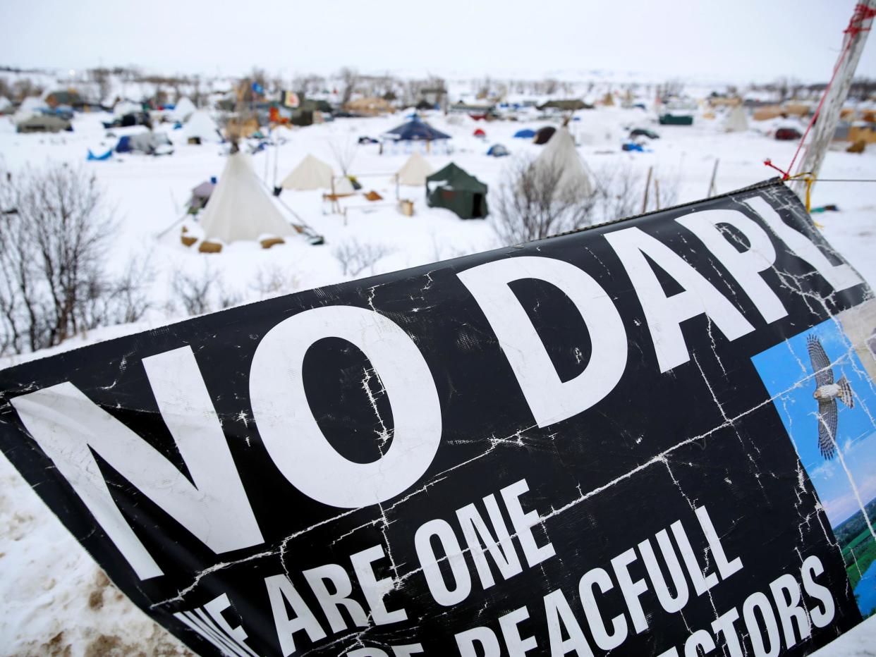 A banner flies in the Dakota Access Pipeline protest camp near Cannon Ball, North Dakota: Terray Sylvester/Reuters