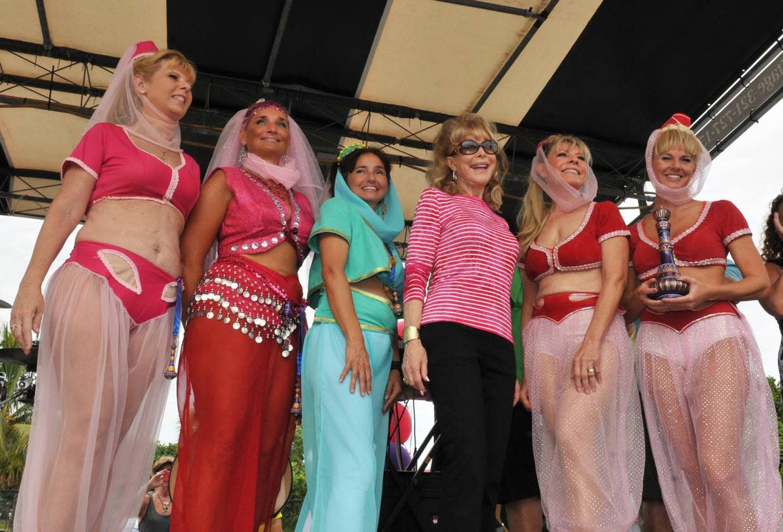 Barbara Eden, shown on stage with runners who dressed like her TV character Jeannie during a 2015 Florida half marathon. Eden was on “I Dream of Jeannie” from 1965-1970.