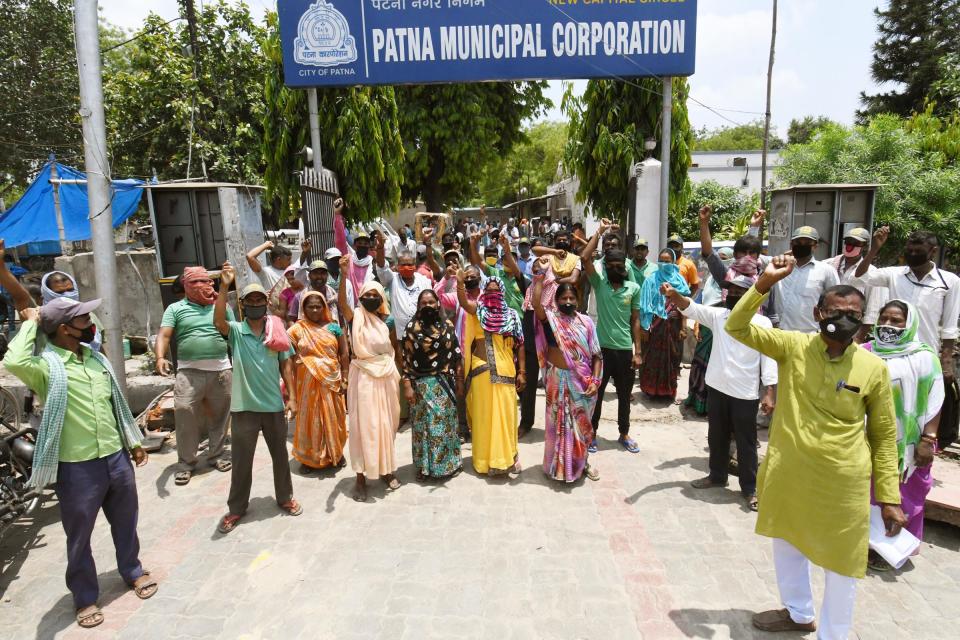 PATNA, INDIA - JUNE 7: Patna Municipal Corporation employees during a demonstration and call for strike in support of various demands at PMC office, on June 7, 2020 in Patna, India. (Photo by Santosh Kumar/Hindustan Times via Getty Images)