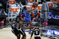 Oklahoma City Thunder guard Hamidou Diallo (6) shoots against Los Angeles Clippers forward Kawhi Leonard, bottom center, during the first quarter of an NBA basketball game Friday, Jan. 22, 2021, in Los Angeles. (AP Photo/Ashley Landis)