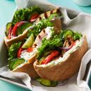 <p>Cucumbers do double duty in this healthy Greek-inspired chicken pita recipe—they're grated to lend a refreshing flavor to the quick cucumber-yogurt sauce and sliced to provide cool crunch tucked into the pita. Serve these sandwiches for a healthy dinner or light lunch. <a href="https://www.eatingwell.com/recipe/273182/chicken-cucumber-pita-sandwiches-with-yogurt-sauce/" rel="nofollow noopener" target="_blank" data-ylk="slk:View Recipe" class="link ">View Recipe</a></p>