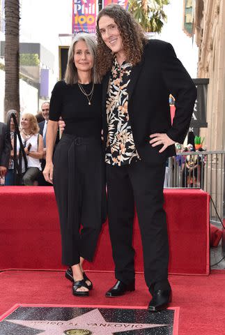 <p>Alberto E. Rodriguez/Getty</p> Weird Al Yankovic and his wife, Suzanne Yankovic, attend a ceremony honoring "Weird Al" Yankovic with the 2,643rd star on the Hollywood Walk of Fame on August 27, 2018.