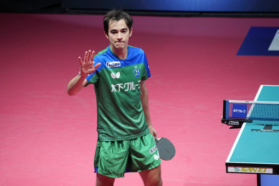 Brazil's Hugo Calderano greets players after a WTT tournament table tennis match, Sunday, Feb. 12, 2023, in Kawasaki, near Tokyo. Calderano is No. 5 in the sport’s ranking, he reached No. 3 a year ago, and he's defeated many of the top Chinese including No. 1 Fan Zhendong. (AP Photo/Eugene Hoshiko)