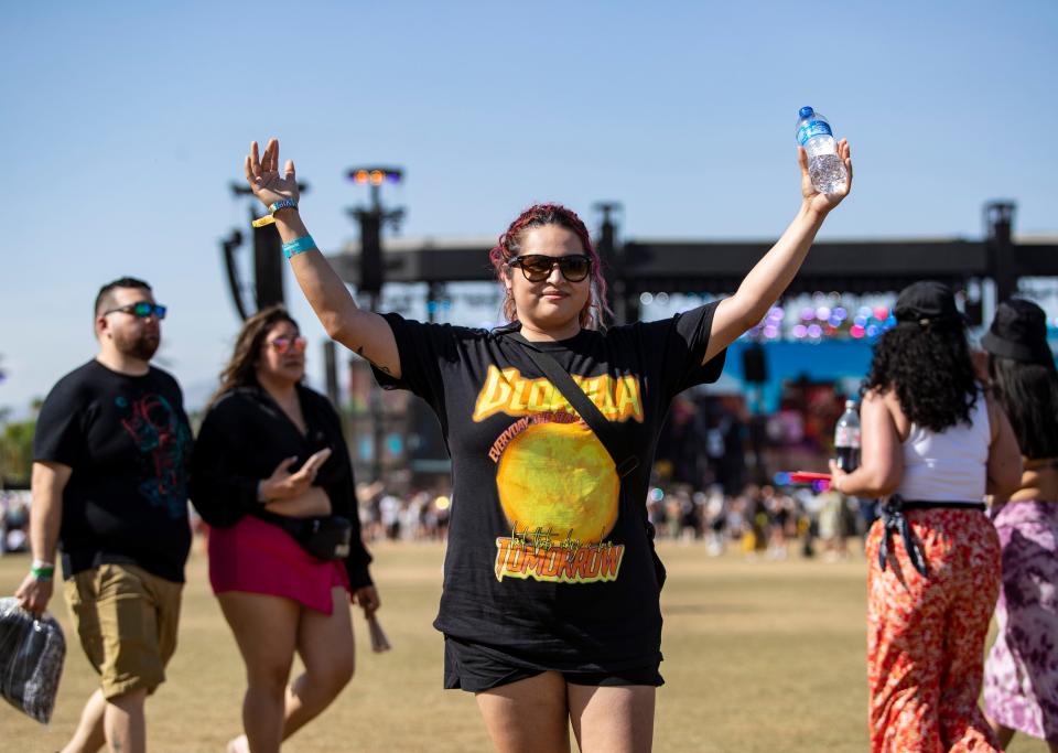 Prisilla Gamboa of La Quinta poses for a photo in front of the Coachella stage as GloRilla performs during the Coachella Valley Music and Arts Festival at the Empire Polo Club in Indio, Calif., Saturday, April 22, 2023. 