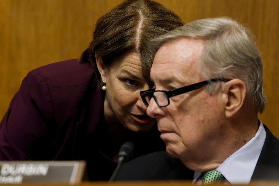 WASHINGTON, DC - Sen. Amy Klobuchar (D-MN) speaks to Senate Judiciary Chairman Richard Durbin (D-IL) during a hearing on "Protecting America’s Children From Gun Violence" with the Senate Judiciary Committee at the U.S. Capitol on June 15, 2022.