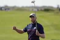 Team USA's Daniel Berger celebrates after making a putt on the 11th hole during a foursome match the Ryder Cup at the Whistling Straits Golf Course Friday, Sept. 24, 2021, in Sheboygan, Wis. (AP Photo/Jeff Roberson)