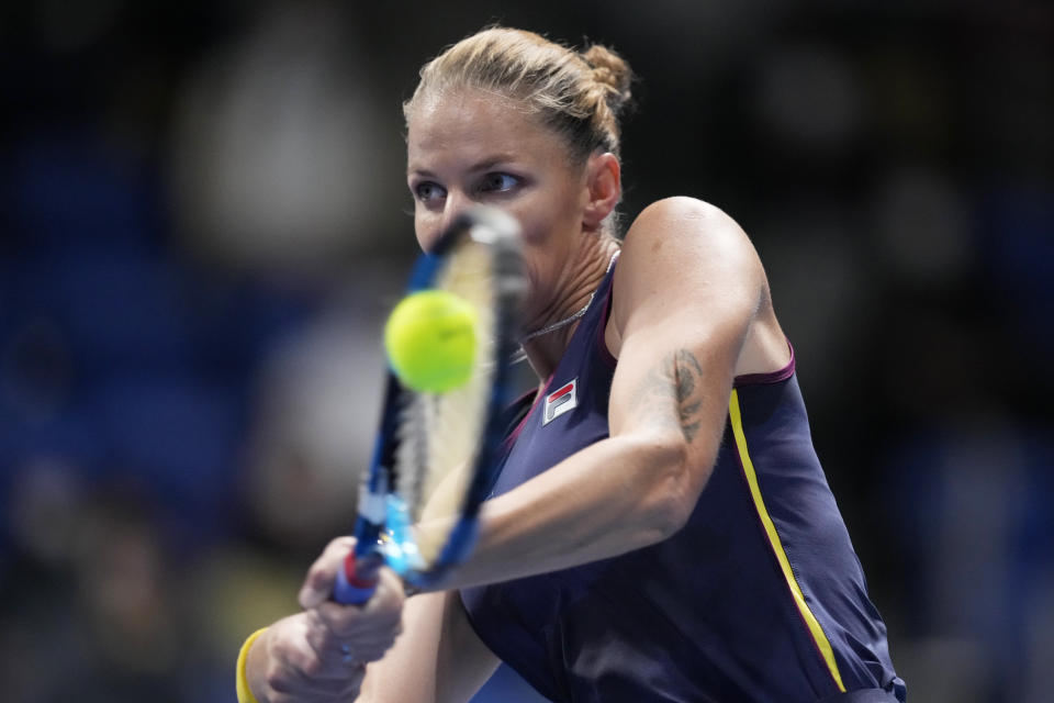 Karolina Pliskova of the Czech Republic returns a shot against Isabella Shinikova of Bulgaria during a singles match in the Pan Pacific Open tennis tournament in Tokyo, Tuesday, Sept. 20, 2022. (AP Photo/Hiro Komae)