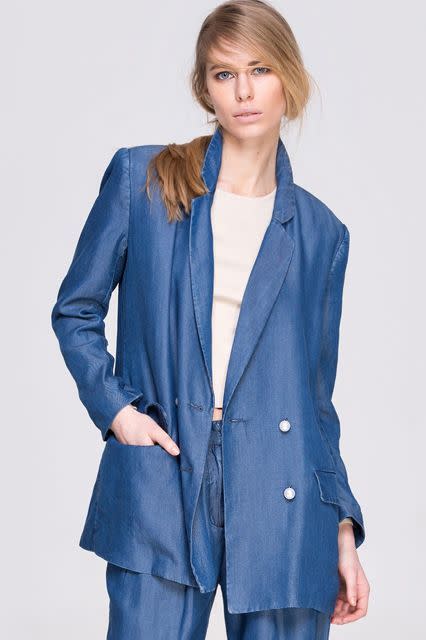 The Denim Blazer If you’re going for a chambray variation, keep the silhouette boxy and oversized for that sought-after, model-off-duty appearance. Consider your brunch uniform found. Front Row Shop Tencl Denim Blazer, $81$68.85, available at Front Row Shop.