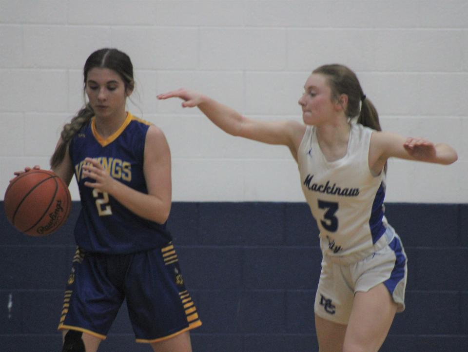 Freshman Rian Esper (right) has been a major contributor for the Mackinaw City girls this season, using ferocious defense to stymie opponents night after night.