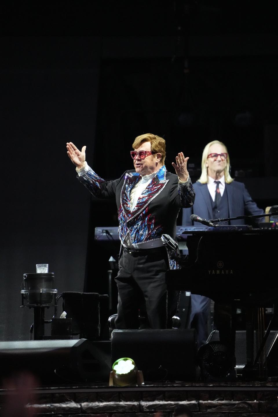 Elton John Wednesday at Gillette Stadium. Behind John is keyboardist Kim Bullard.