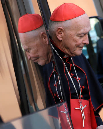 FILE PHOTO: Theodore McCarrick arrives for a meeting at the Synod Hall in the Vatican March 4, 2013, when he was still a U.S. cardinal. REUTERS/Max Rossi/File Photo