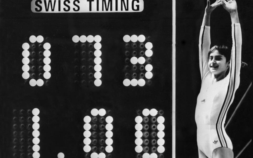 Comaneci's feat was so unprecedented the board had not been programmed to display a total higher than 9.99 - AFP