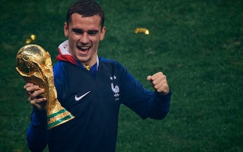 Antoine Griezmann of France celebrates with the trophy - Credit: Quality Sport Images/Getty Images