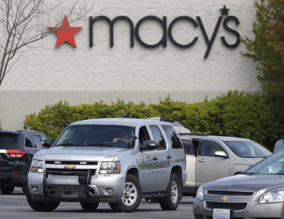 <p>A Skagit County Sheriff’s Office vehicle is parked in front of the Macy’s department store, Saturday, Sept. 24, 2016, at the Cascade Mall in Burlington, Wash. Authorities said Saturday several people were dead after the shooting Friday night and the suspect was still at large. The identity of the suspect, his motive and how he got a rifle into the mall remained unanswered. (AP Photo/Ted S. Warren) </p>