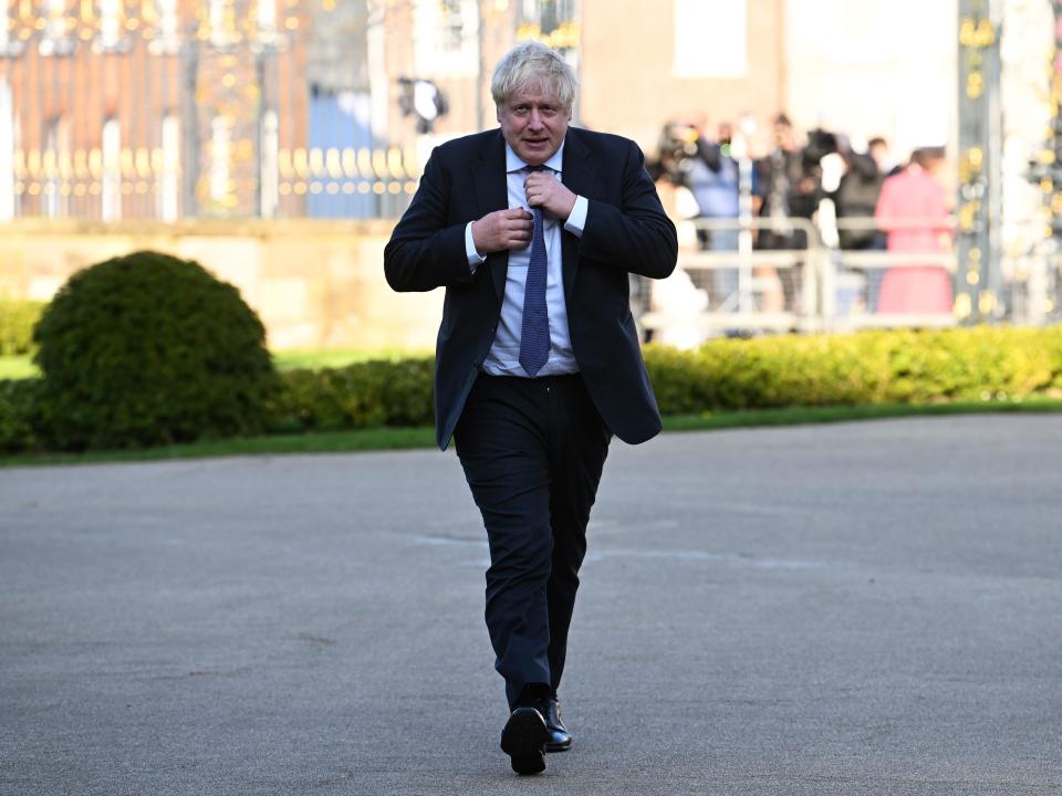 Former UK prime minister Boris Johnson walking.