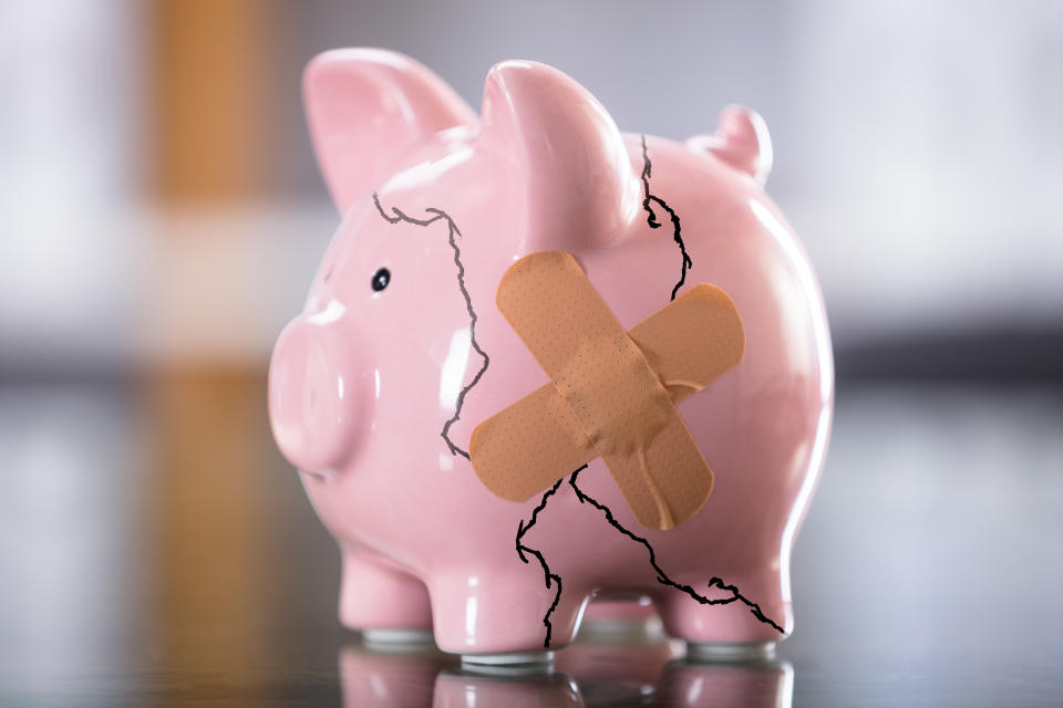 Photo Of Broken Pink Piggybank With Bandage