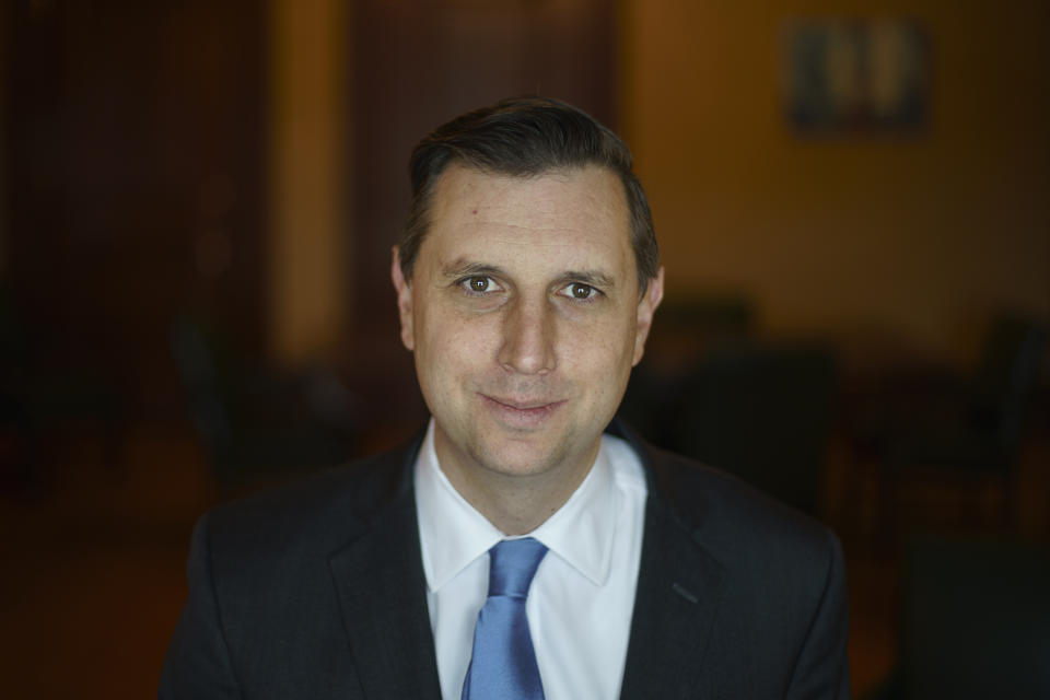 FILE - Rhode Island General Treasurer Seth Magaziner is photographed in his office in Providence, R.I., Monday, Feb. 7, 2022. Magaziner, a Democrat, says that instead of running for governor as he had previously announced, he would instead seek the state's seat in Congress being vacated by U.S. Rep. Jim Langevin. (AP Photo/David Goldman, File)