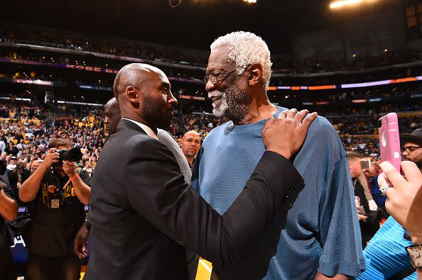 LOS ANGELES, CA - DECEMBER 18: Bill Russell and Kobe Bryant greet after the jersey retirement ceremony on December 18, 2017 at STAPLES Center in Los Angeles, California. NOTE TO USER: User expressly acknowledges and agrees that, by downloading and/or using this Photograph, user is consenting to the terms and conditions of the Getty Images License Agreement. Mandatory Copyright Notice: Copyright 2017 NBAE (Photo by Andrew D. Bernstein/NBAE via Getty Images)