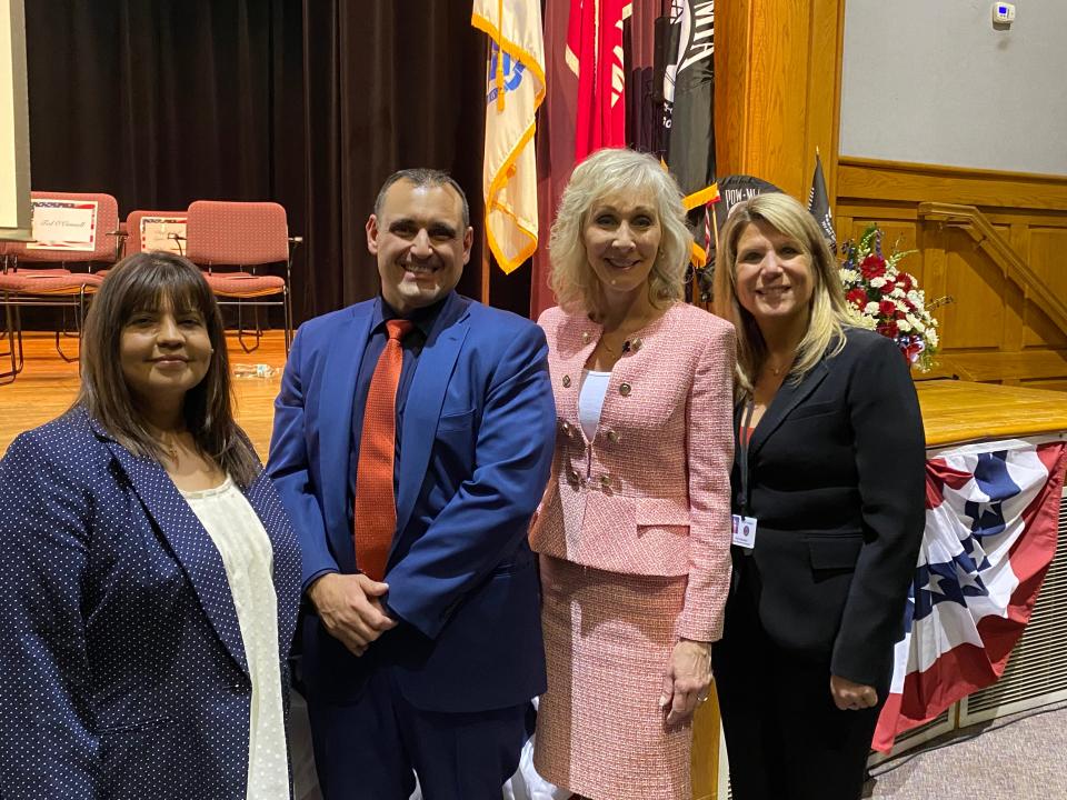 From left, the mayor's Chief of Staff Ligia Madeira; Taunton Chief Financial Officer Patrick Dello Russo; Mayor Shaunna O' Connell; and Taunton Human Resources Director Amy Kazlauskas stop for a photo after the city's inauguration ceremony on Tuesday, Jan. 2, 2024, at the former Coyle & Cassidy high school.