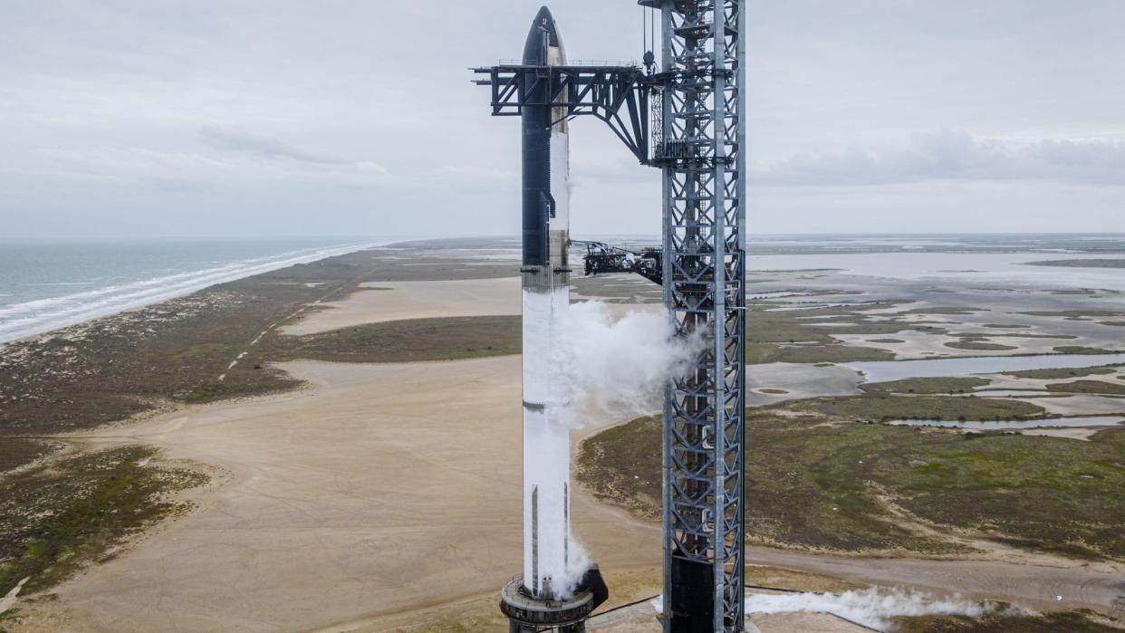  SpaceX performed a Starship wet dress rehearsal on Jan. 23, 2023, fueling the giant vehicle up for the first time ever. As this photo shows, the stainless-steel Starship went frosty white after the loading of supercold propellant. 