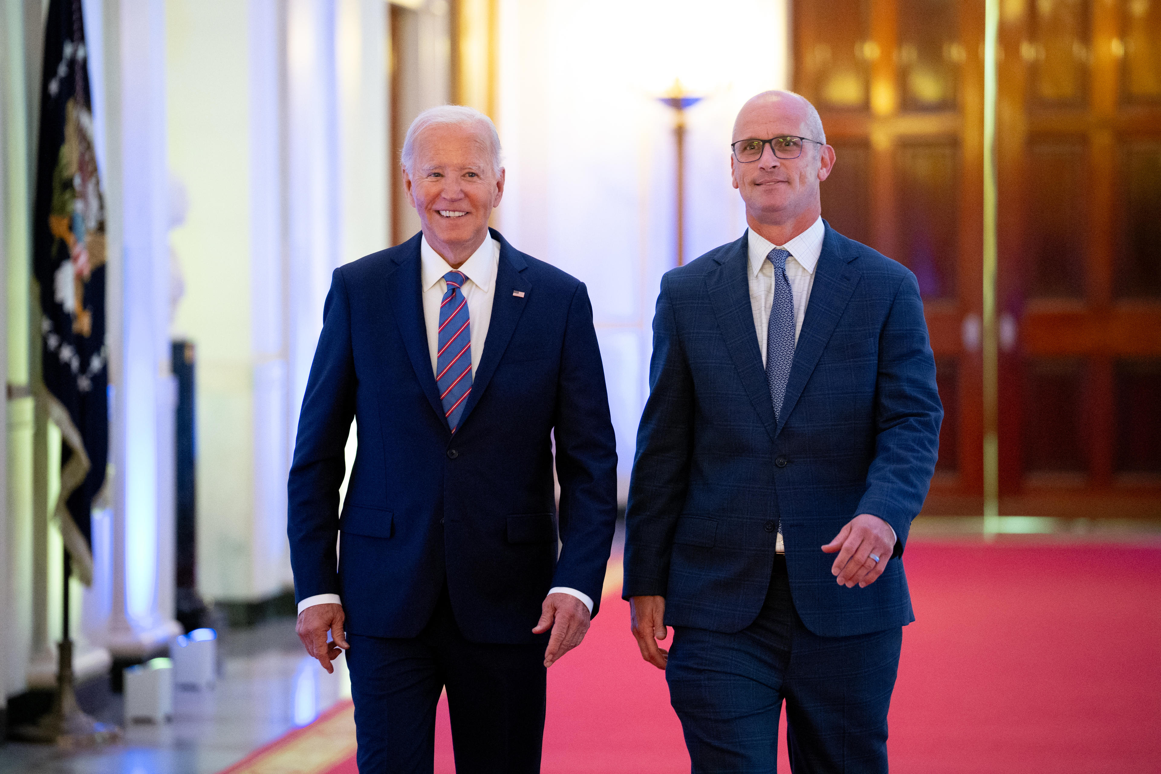 WASHINGTON, DC - SEPTEMBER 10: U.S. President Joe Biden and Connecticut Huskies head coach Dan Hurley arrive for a celebration of the 2023-2024 University of Connecticut Huskies Men's Basketball NCAA championship team in the East Room of the White House on September 10, 2024 in Washington, DC. The Huskies beat the Purdue Boilermakers 75-60 for their sixth NCAA Championship and their second championship in a row. (Photo by Andrew Harnik/Getty Images)