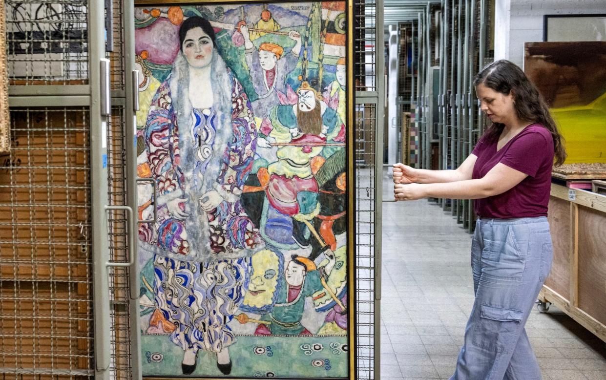 Nathalie Andrijasevic, assistant curator in Tel Aviv, places a Klimt in storage against Iran threat