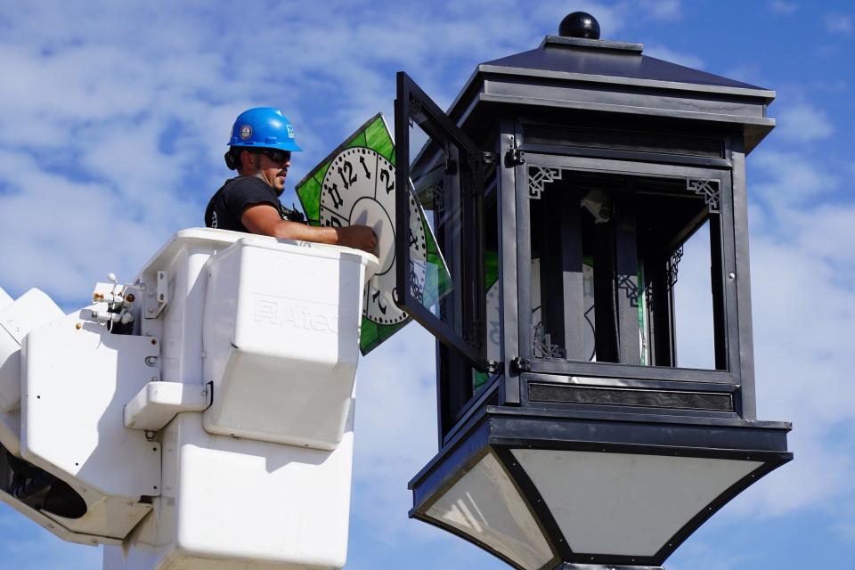 Crews have reinstalled Panama City's historic century-old clock that was heavily damaged five years ago by Category 5 Hurricane Michael.