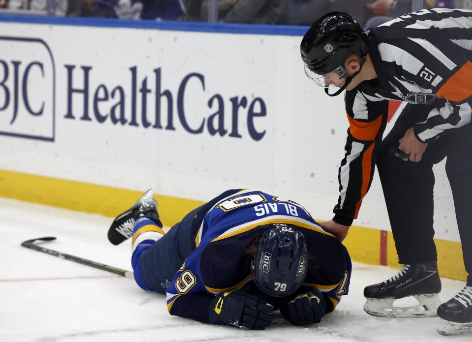 St. Louis Blues forward Sammy Blais (79) falls to the ice during the first period of an NHL hockey game against the Toronto Maple Leafs on Monday, Feb. 19, 2024, at Enterprise Center in St. Louis.(Christine Tannous/St. Louis Post-Dispatch via AP)