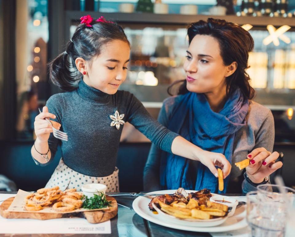 mom and daughter at dinner