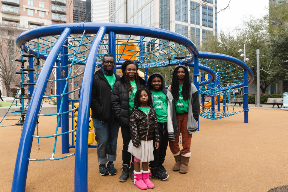 Lotanna and Aesha Egbuna with their three children Mia, Elijah, and Aniyah at Discovery Green Park. (Jacque Jackson for NBC News)