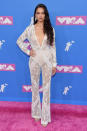 <p>Das australische Model Shanina Shaik sah in dem durchsichtigen weißen Jumpsuit von Kopf bis Fuß fantastisch aus. Quelle: Getty </p>